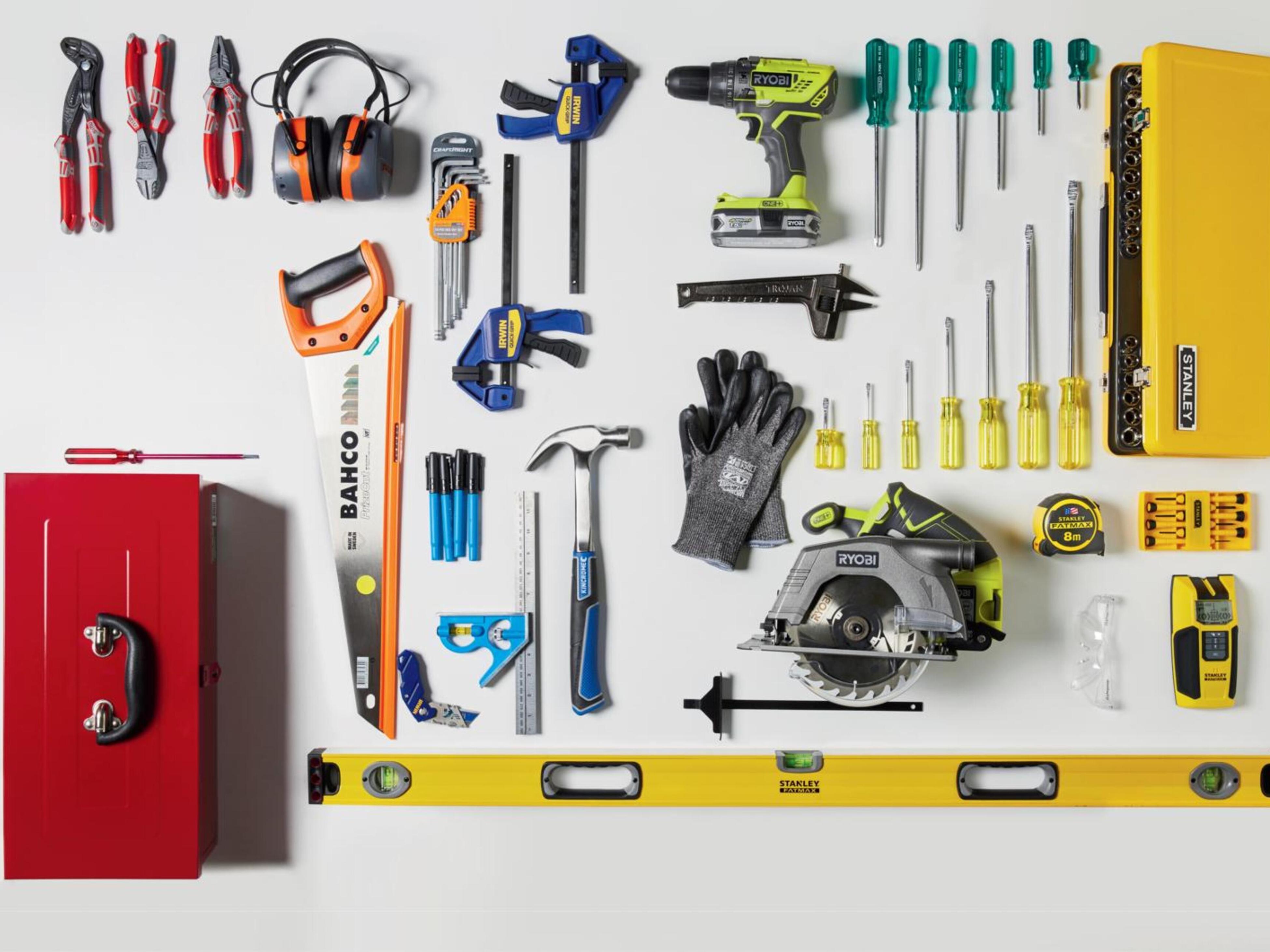 Tools laid out on a bench for a first shed setup