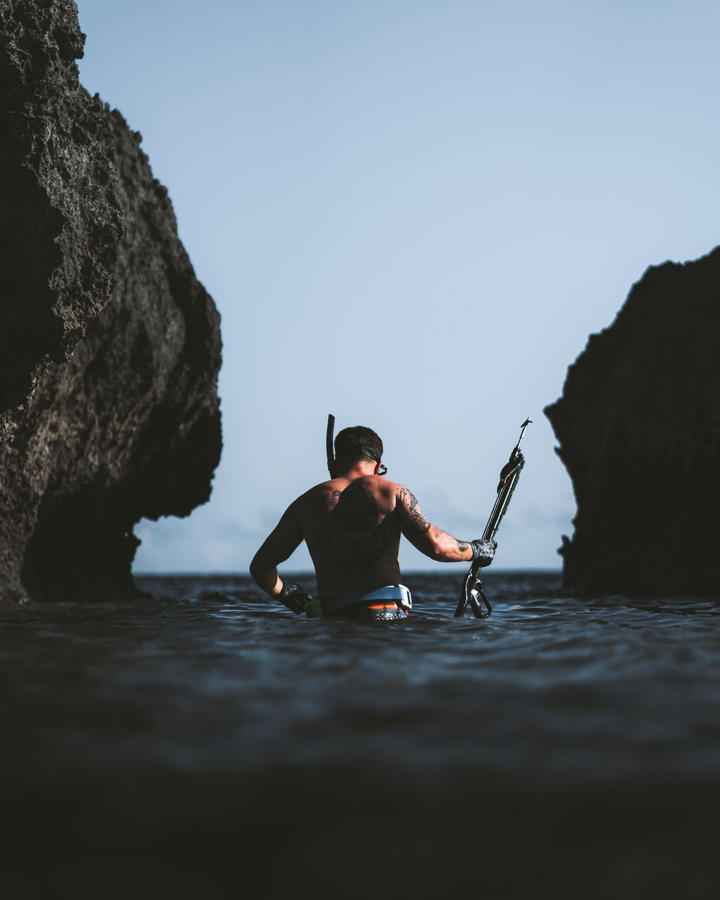Spearfisher in Australian shark country preparing for a dive