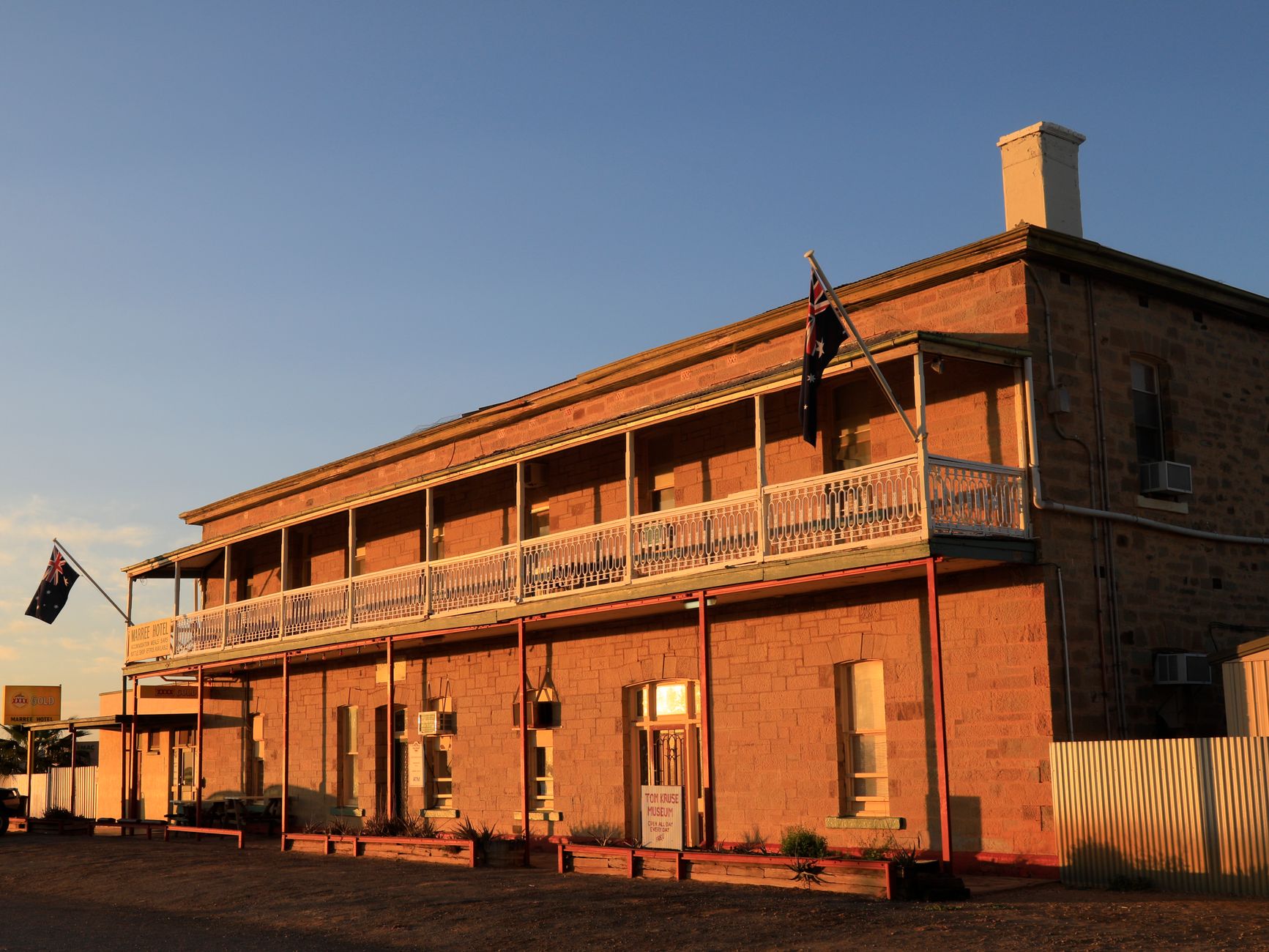 Historic country hotel glowing in sunset light