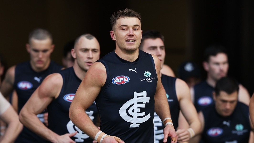 Patrick Cripps leads Carlton out onto the field during round 15, 2026.