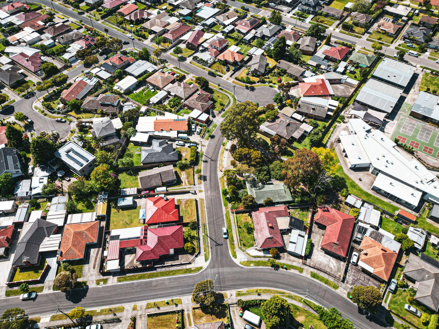 Aerial view of a Melbourne suburb, showing how a modest price dip still leaves a lot of postcode spread between affordable homes and the city.