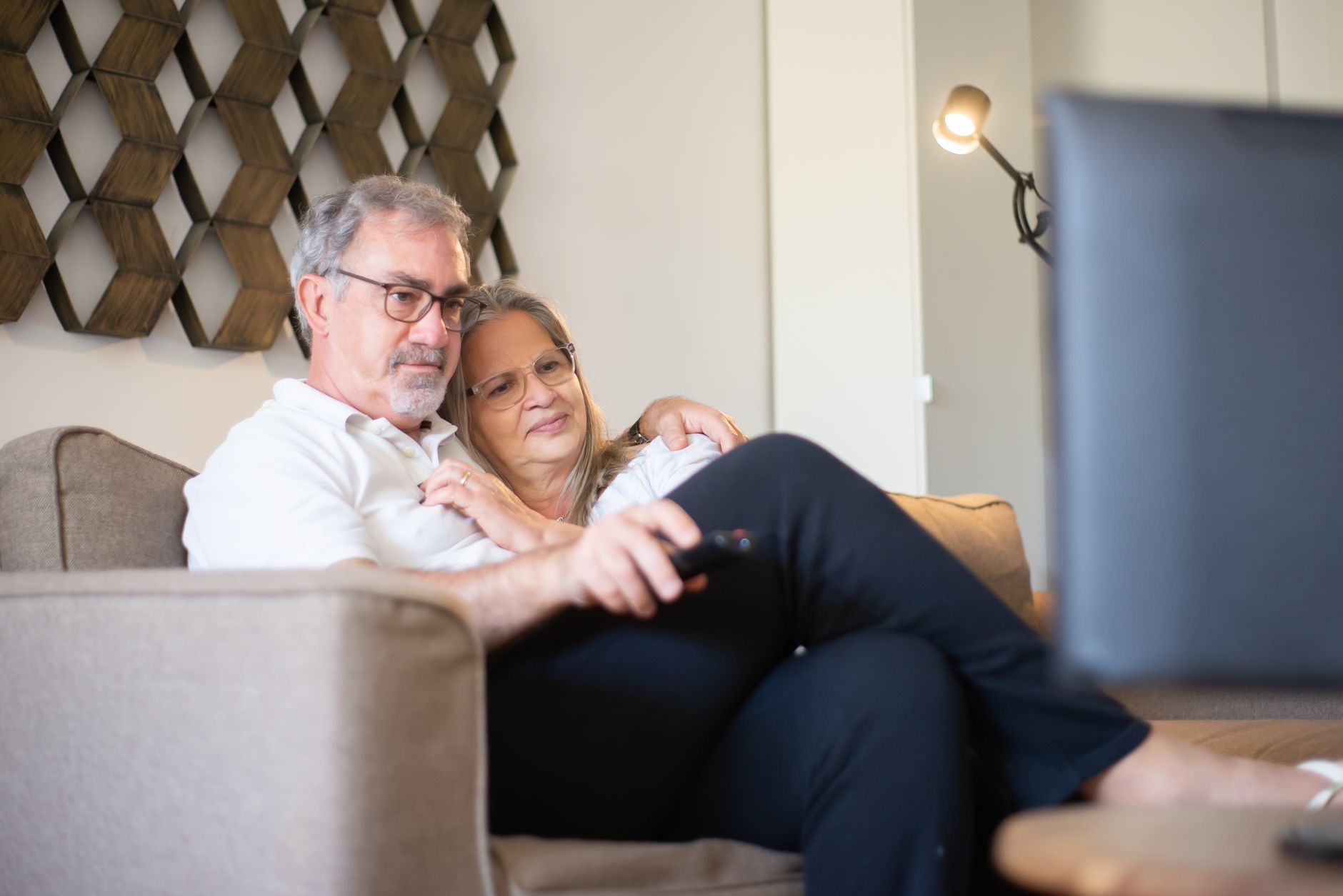 Older adult using smart-home technology at home