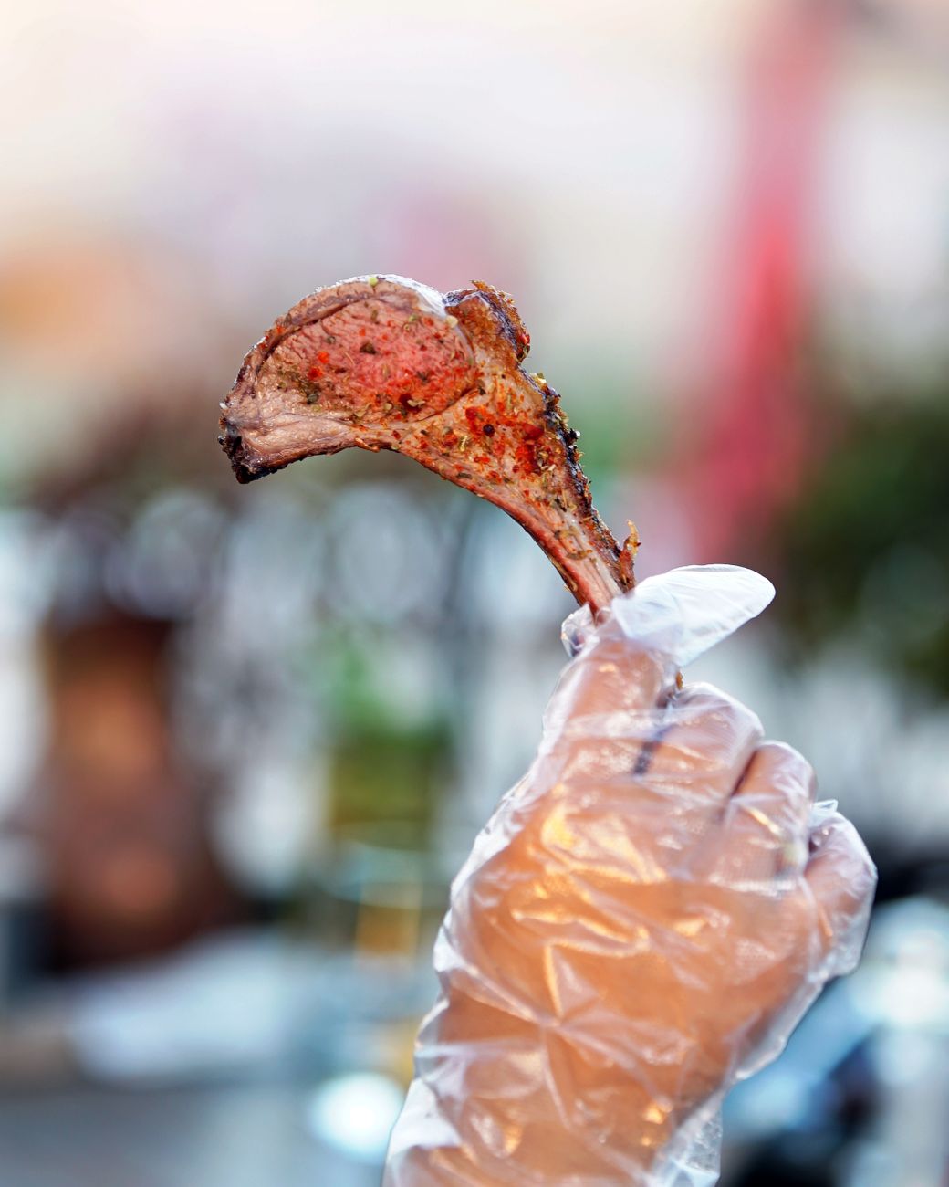 Raw lamb chops on a tray, illustrating export demand and local barbecue prices