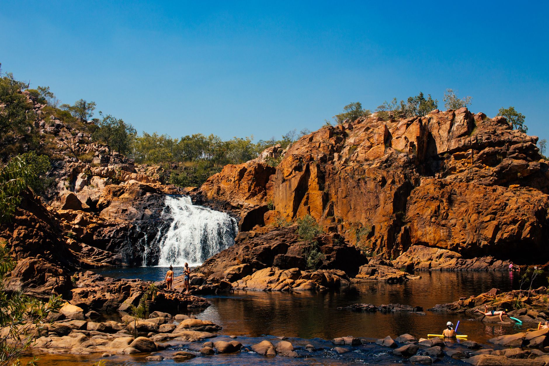 Waterfall and swimming hole in a tropical national park landscape